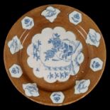 A large English delft plate, probably Lambeth, mid 18th century