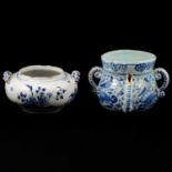 An English delft blue and white bowl and a posset pot