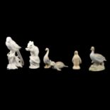 Eighteen animal and bird figurines.