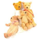 Teddy bears, four mid to early 20th century, all with jointed limbs