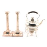 Pair of silver-plated candlesticks, and a silver-plated spirit kettle on a stand.