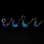 Four Mtarfa glass swans.