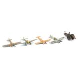 Dinky Toys, four aircraft die-cast models and a tin-plate tank model.