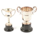 Silver trophy cup, possibly Garrard & Co Ltd, London 1919, and another silver trophy cup.