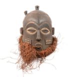 Carved African tribal helmet mask, Bena Biombo, Democratic Republic of Congo,