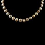 A freshwater pearl choker necklace, oval shape 7x10mm.