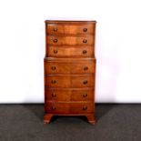 Reproduction mahogany bowfront chest on chest, of small proportions, fitted with seven long