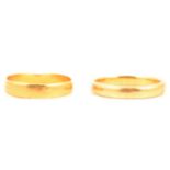 Two 22 carat yellow gold wedding bands.