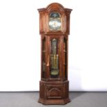 Modern oak case corner longcase clock, movement striking on gongs, by Interclock