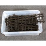 One tub of custom made O gauge model railway track, including points.