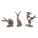 § Paul Jenkins, three cast bronze models of Hares