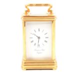Brass cased carriage clock by Thwaites & Reed,