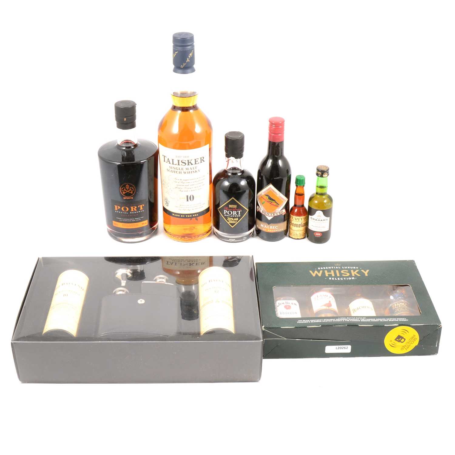 Bottle of Talisker 10 year old whisky, miniature gift sets, etc