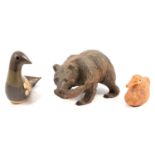Studio pottery wares, wooden and soapstone carvings, animal figurines, and other ceramics.