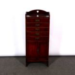 Late Victorian walnut music cabinet, top with a three-quarter gallery, five drawers with four fronts