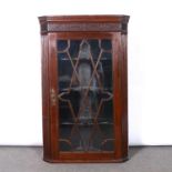 George III mahogany hanging corner cupboard,