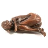 Contemporary small patinated bronze of a reclining nude female
