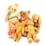 Vintage teddy bears, six including Merrythought dog.