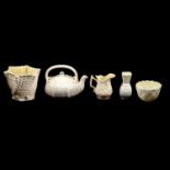 Belleek teapot, vases, cups, saucers, sugar bowls and jugs.