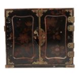 Japanese black lacquered table cabinet, metal fitments, two panelled doors enclosing drawers,