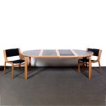 Rud Thygesen and Johnny Sorensen for Magnus Olesen, a circular table with six associated chairs
