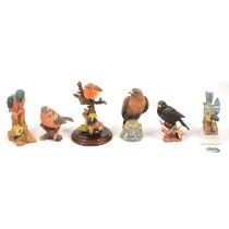 Collection of bird figures, including Country Artists