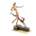 Art Deco patinated spelter dancer with hound