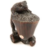 Signed wooden netsuke of a frog, 50mm.