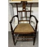 Edwardian inlaid mahogany elbow chair.