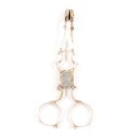 Pair of silver sugar tongs, R.M.