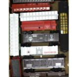 Eleven O gauge model freight cars, rolling-stock and observation coach.