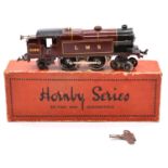 Hornby O gauge model railway locomotive, 4-4-2 LMS 2180, clock work, boxed.