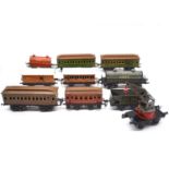 Ten Bing O gauge model railway rolling-stock and passenger coaches.