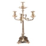 A composite Victorian silver four-light silver candelabra