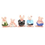 Set of five Wade NatWest pig money banks.