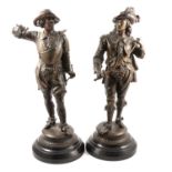 Pair of patinated spelter cavaliers,