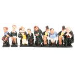 Eight Royal Doulton Charles Dickens figurines.