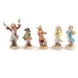 Five Dresden porcelain monkey band figures,