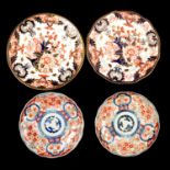 Two Royal Crown Derby plates and two Imari plates.