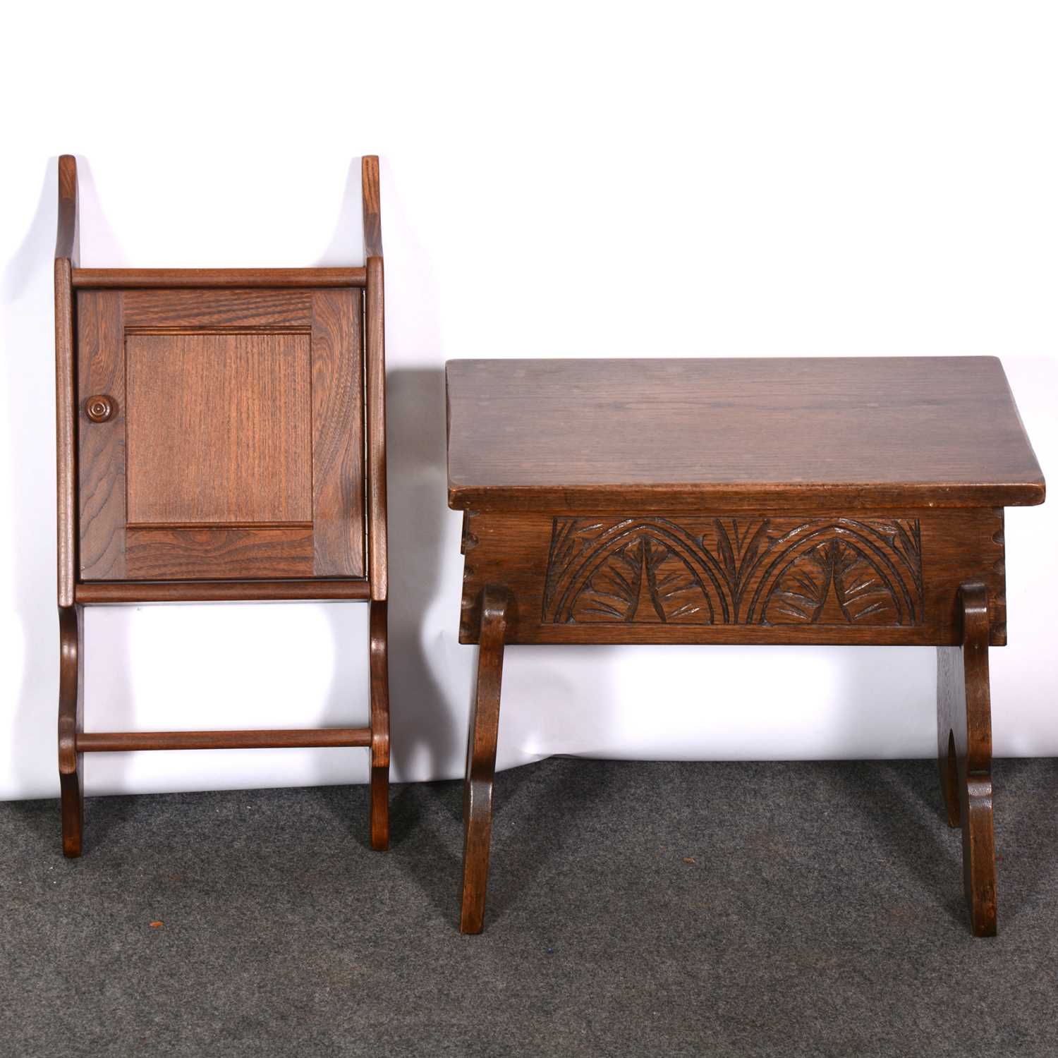 Modern Ercol medium elm key cabinet and a reproduction oak box seat stool.