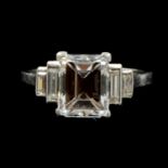 A diamond solitaire ring, rectangular step cut stone, 2.38 carats.