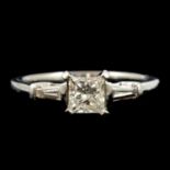 A diamond solitaire ring, square modified brilliant cut stone, 0.71 carat, internally flawless.