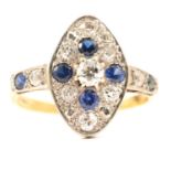 A sapphire and diamond marquise cluster ring.