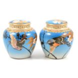 Pair of Japanese Satsuma blue ground jars and covers