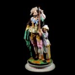 French porcelain group, Traveller with child