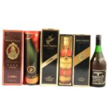 Six bottles of assorted cognac and brandies, including Remy Martin and Martell