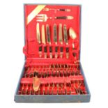 Canteen of Thai bronze and hardwood cutlery,