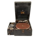 Brownie box type portable record player; an HMV portable gramophone.