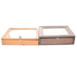 Two table top display cases,