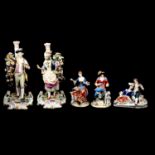 Pair of Meissen style figural candlesticks and eight other Continental figures